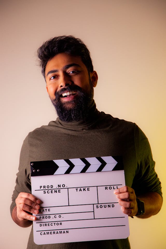 A movie Director holds a slate